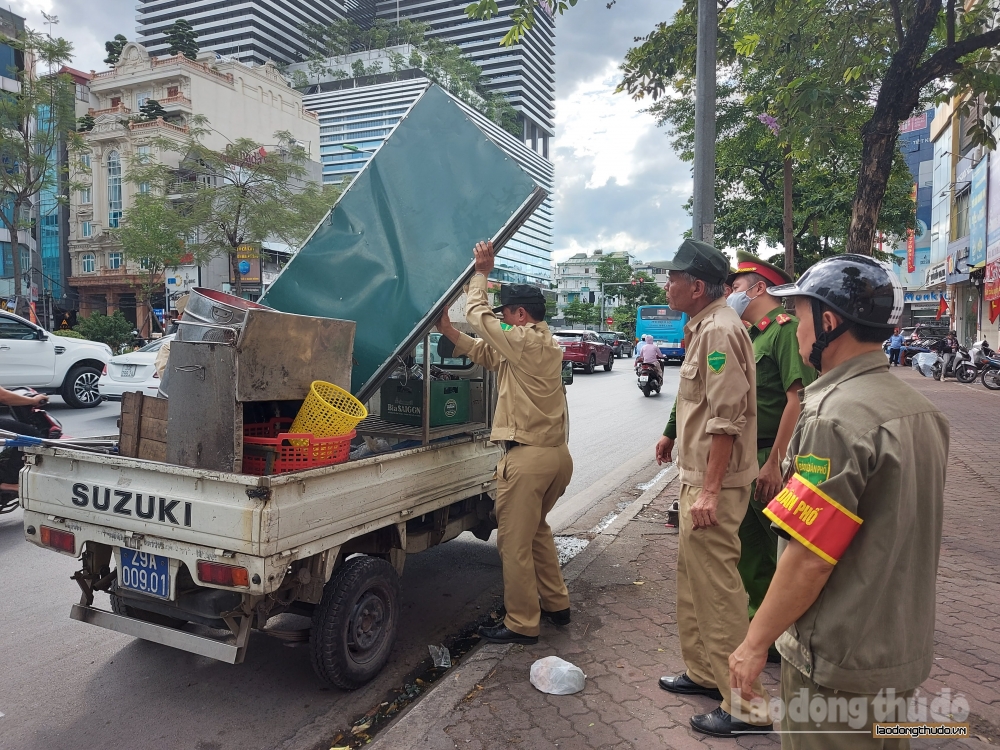 quan dong da kien quyet xu ly nghiem viec lan chiem loi di chung lam noi kinh doanh buon ban 2